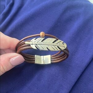 Brown Leather Bracelet with Silver Feather. Light weight with a magnetic clasp